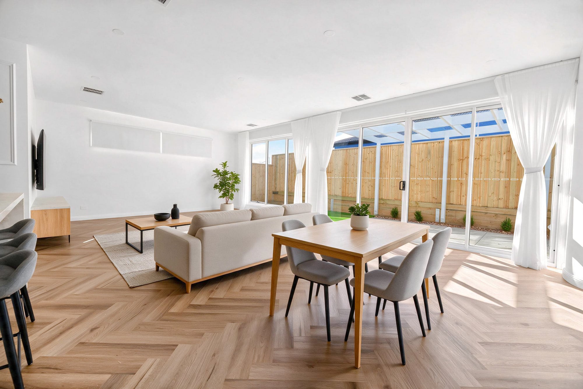 Open plan living and dining, before and after virtual staging
